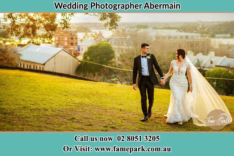 Bride and Groom walking Abermain