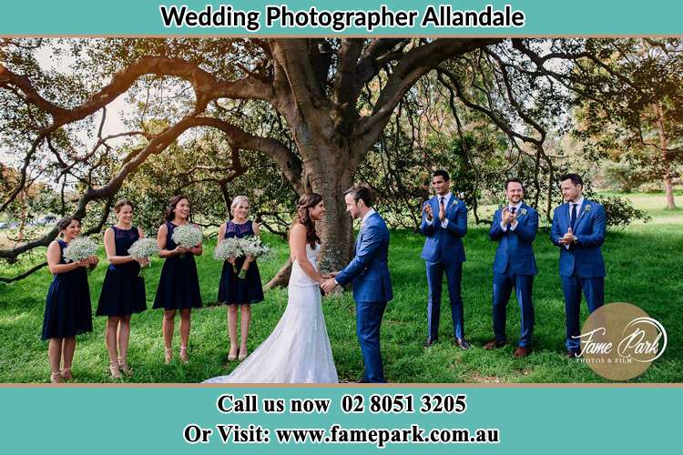 Photo of bride and groom with their entourage Allandale