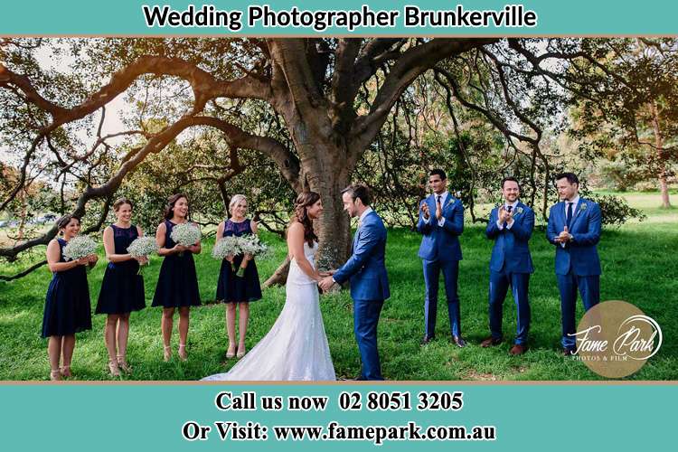 Photo of bride and groom with their entourage Brunkerville NSW 2323