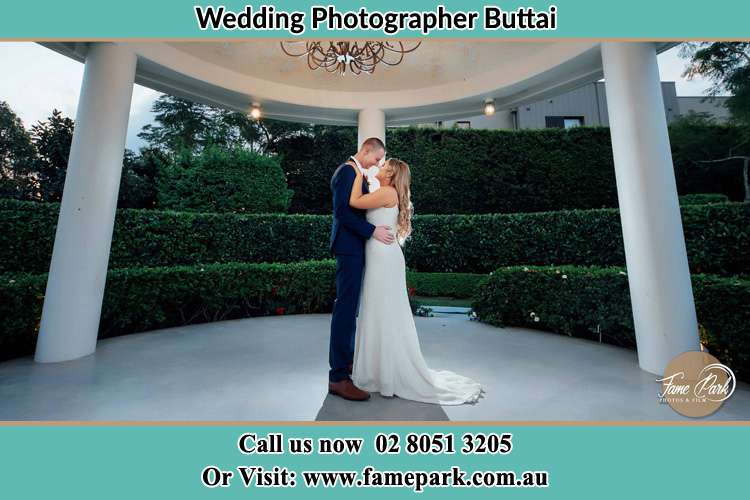 Photo of the Bride and Groom dancing Buttai