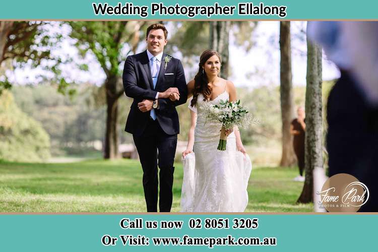 Photo of the Groom and the Bride walking the aisle Ellalong NSW 2325