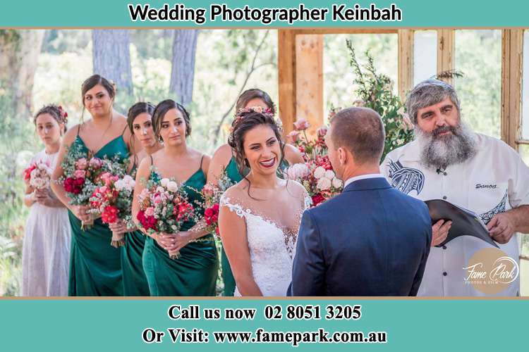 Photo of the Bride and the Groom during the matrimony Keinbah NSW 2320