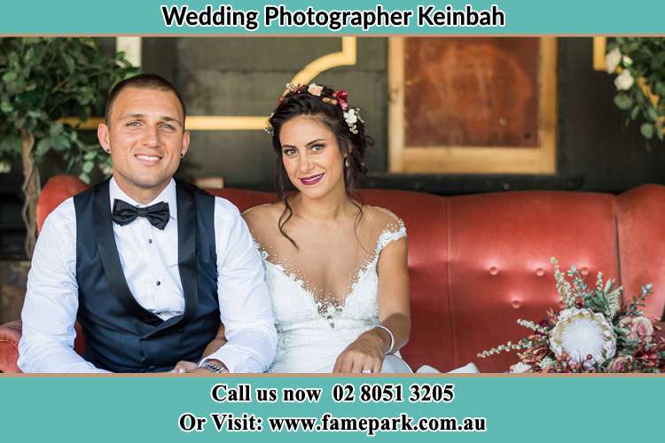 Photo of the Groom and the Bride sitting Keinbah NSW 2320