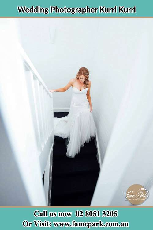 Photo of the Bride going down stair Kurri Kurri NSW 2327