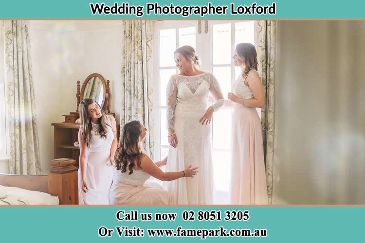 Bride near the window with the Bride's Maids Loxford