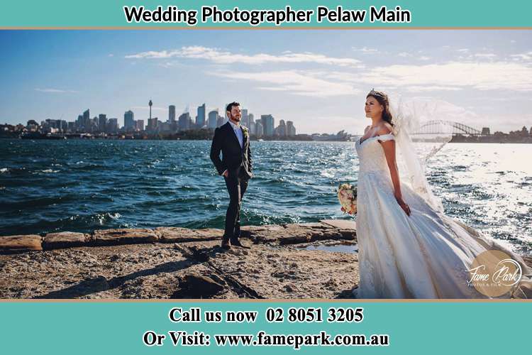 Photo of the Bride and the Groom at the sea front Pelaw Main NSW 2327