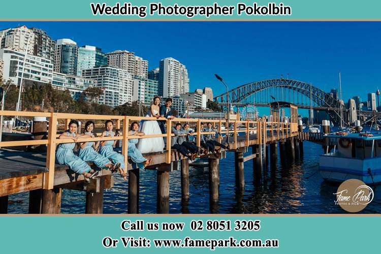 Photo of the Groom and the Bride together with their entourage at the bridge Pokolbin NSW 2320