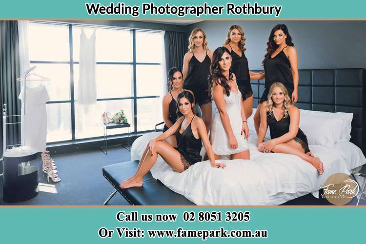 Photo of the Bride with the bridesmaids on the bed Rothbury NSW 2320